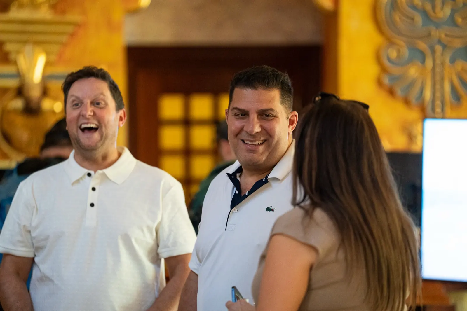 Members laughing together at Destination Orbis 2026